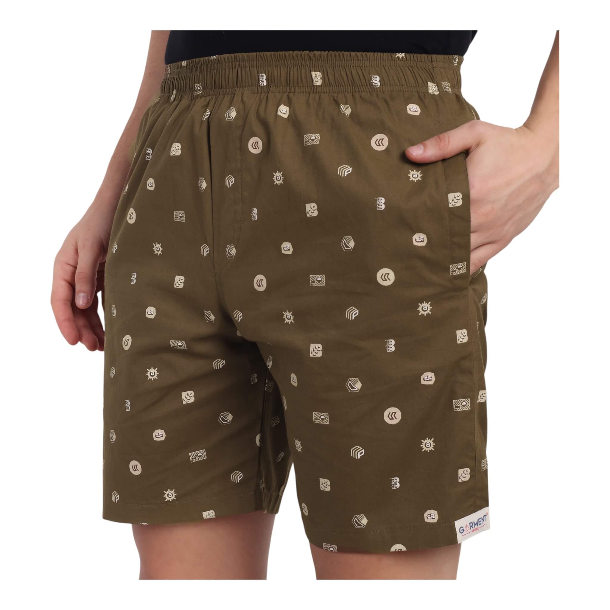 Men's brown patterned shorts with a comfortable elastic waistband, perfect for warm weather and casual outings.