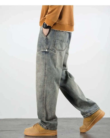 Casual outfit featuring baggy denim jeans and tan sneakers, perfect for a trendy everyday look.